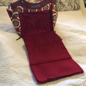 Petunia Pickle Bottom Red and Brown Kids Diaper Bag with Fold-Out Changing Pad